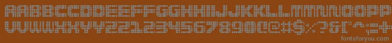 Wi5medGrid-fontti – harmaat kirjasimet ruskealla taustalla