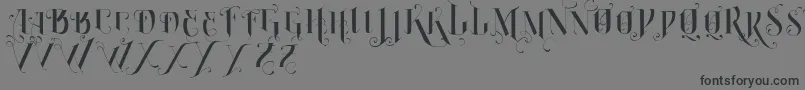 VtksBurning Font – Black Fonts on Gray Background