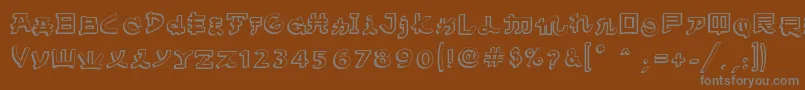 AlmostJapaneseComic-Schriftart – Graue Schriften auf braunem Hintergrund