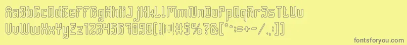 DayakShieldHollow Font – Gray Fonts on Yellow Background