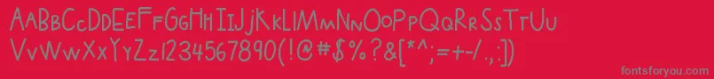 フォントKbupinsmoke – 赤い背景に灰色の文字