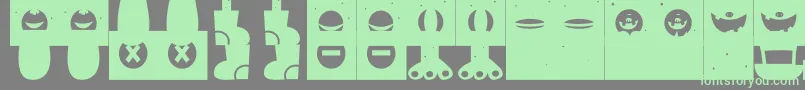 MonsterHappy Font – Green Fonts on Gray Background