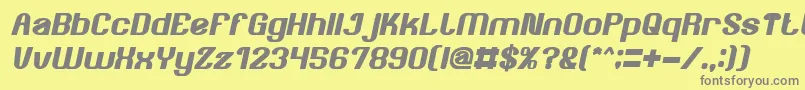 AgeOfAwakeningBoldItalic-Schriftart – Graue Schriften auf gelbem Hintergrund