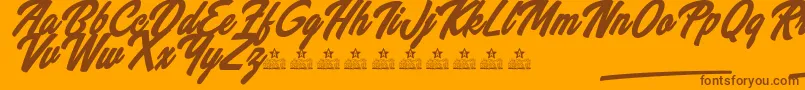 WannabeesPersonalUse-Schriftart – Braune Schriften auf orangefarbenem Hintergrund
