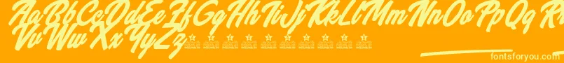 Czcionka WannabeesPersonalUse – żółte czcionki na pomarańczowym tle