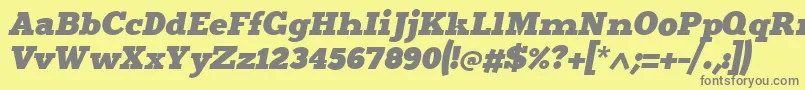 フォントMerititalic4 – 黄色の背景に灰色の文字