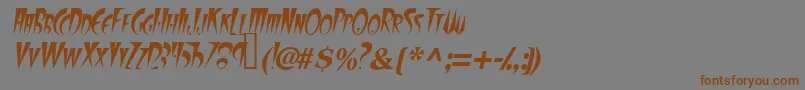 フォントFangsscapssskItalic – 茶色の文字が灰色の背景にあります。