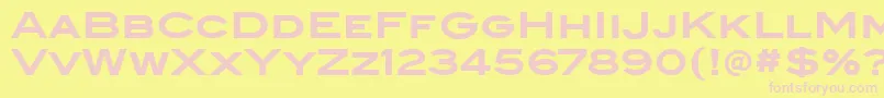 BlairitcTtBold-fontti – vaaleanpunaiset fontit keltaisella taustalla