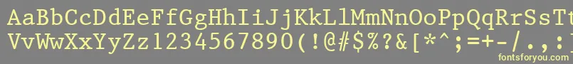 Prestige12PitchBt Font – Yellow Fonts on Gray Background