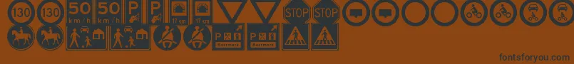 Шрифт TrafficSignsTfb – чёрные шрифты на коричневом фоне