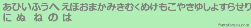 フォントHiraganaTfb – 緑の背景に灰色の文字