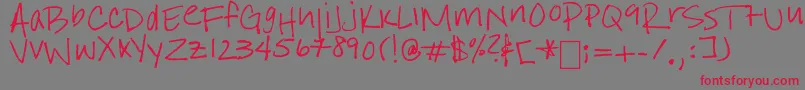 フォントIStillBelieve – 赤い文字の灰色の背景