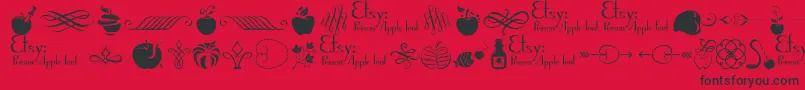 PoisonAppleOrnaments1Demo Font – Black Fonts on Red Background
