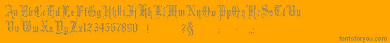 MinsterNo5-Schriftart – Graue Schriften auf orangefarbenem Hintergrund