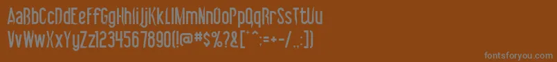Шрифт Vibrolator – серые шрифты на коричневом фоне