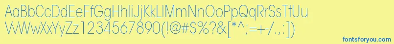 ItcavantgardestdXltcn Font – Blue Fonts on Yellow Background