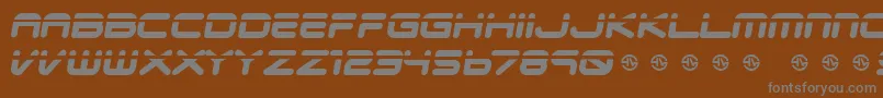 Veloped-Schriftart – Graue Schriften auf braunem Hintergrund