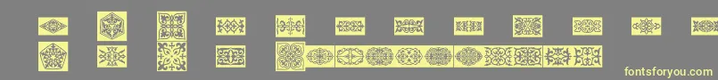 Prtornament4-fontti – keltaiset fontit harmaalla taustalla