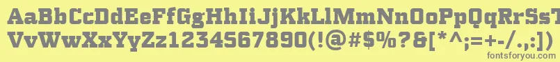 PfsynchproBlack Font – Gray Fonts on Yellow Background