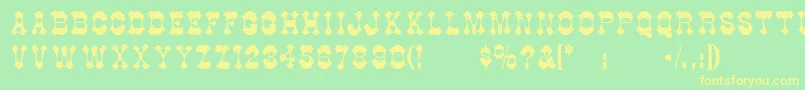 Berlooscomix Font – Yellow Fonts on Green Background