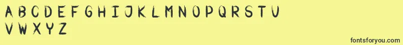 Warbrush Font – Black Fonts on Yellow Background
