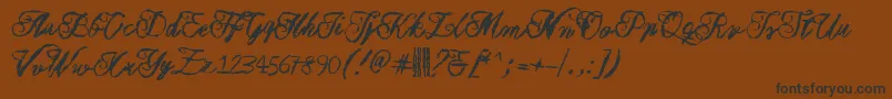 Muurahaiskarhu-fontti – mustat fontit ruskealla taustalla