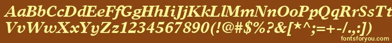 GrecoEuropaSsiBoldItalic-fontti – keltaiset fontit ruskealla taustalla
