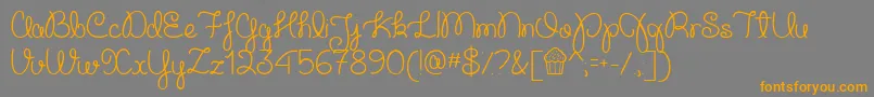 CupcakePartyDemo-Schriftart – Orangefarbene Schriften auf grauem Hintergrund