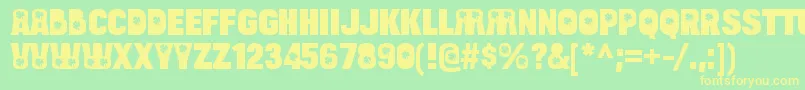 フォントBulltoadluckyRegular – 黄色の文字が緑の背景にあります