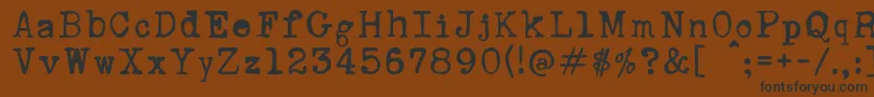 RustyTypewriter-Schriftart – Schwarze Schriften auf braunem Hintergrund