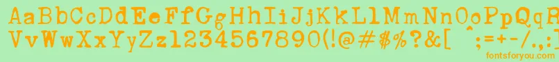 RustyTypewriter Font – Orange Fonts on Green Background