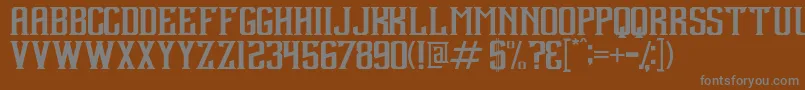 Weitere Informationen zur Debute-Schriftart Debute-Schriftart – Graue Schriften auf braunem Hintergrund