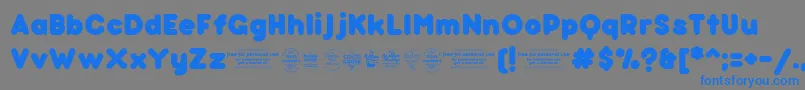 フォントBubbleboddyFattrial – 灰色の背景に青い文字