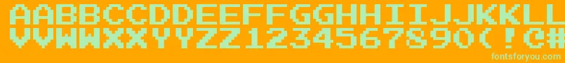 Emulogic Font – Green Fonts on Orange Background