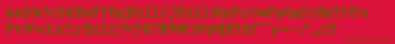 fuente DumboldtypewriterAlternateheavy – Fuentes Marrones Sobre Fondo Rojo