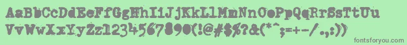 DumboldtypewriterAlternateheavy Font – Gray Fonts on Green Background