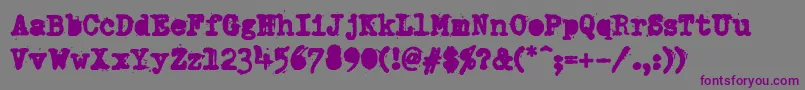 フォントDumboldtypewriterAlternateheavy – 紫色のフォント、灰色の背景