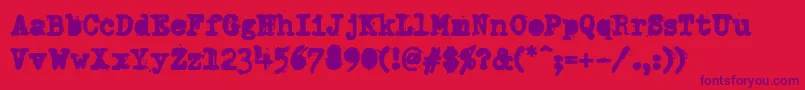 DumboldtypewriterAlternateheavy Font – Purple Fonts on Red Background