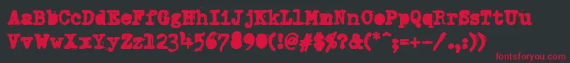 Fonte DumboldtypewriterAlternateheavy – fontes vermelhas em um fundo preto