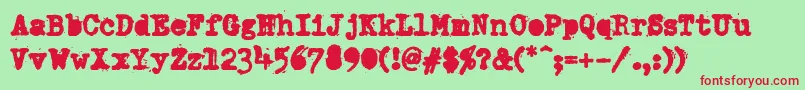 DumboldtypewriterAlternateheavy Font – Red Fonts on Green Background
