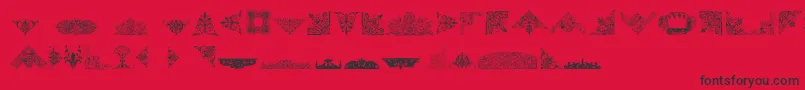 フォントVictorianFreeOrnaments – 赤い背景に黒い文字