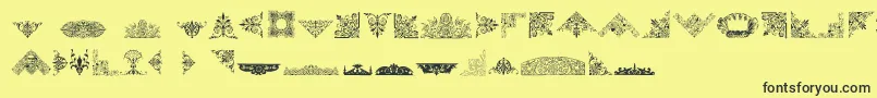 Fonte VictorianFreeOrnaments – fontes pretas em um fundo amarelo