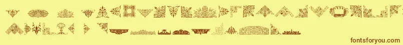 Czcionka VictorianFreeOrnaments – brązowe czcionki na żółtym tle