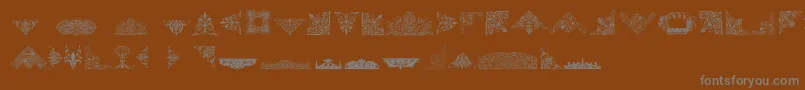 En savoir plus sur la police VictorianFreeOrnaments Police VictorianFreeOrnaments – polices grises sur fond brun