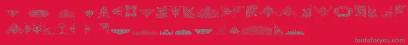 フォントVictorianFreeOrnaments – 赤い背景に灰色の文字