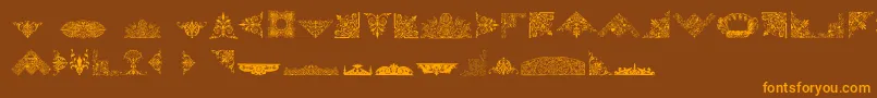 VictorianFreeOrnaments-fontti – oranssit fontit ruskealla taustalla