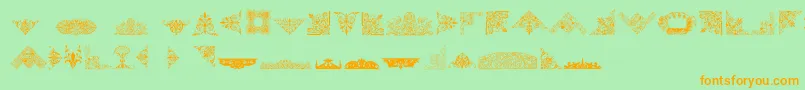 VictorianFreeOrnaments-fontti – oranssit fontit vihreällä taustalla