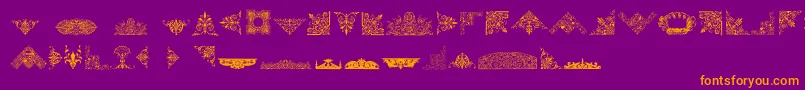 VictorianFreeOrnaments-fontti – oranssit fontit violetilla taustalla