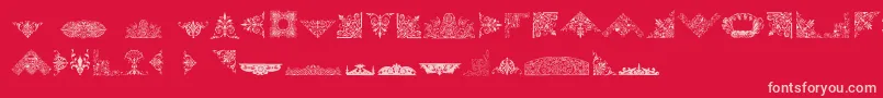 Fonte VictorianFreeOrnaments – fontes rosa em um fundo vermelho