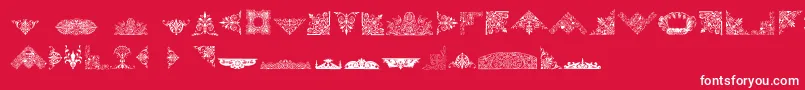 Fonte VictorianFreeOrnaments – fontes brancas em um fundo vermelho